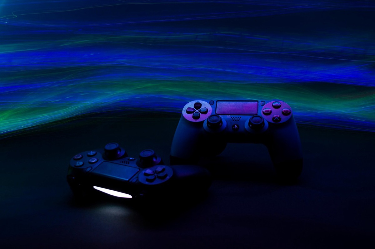 High-end gaming peripherals including a controller and headset.